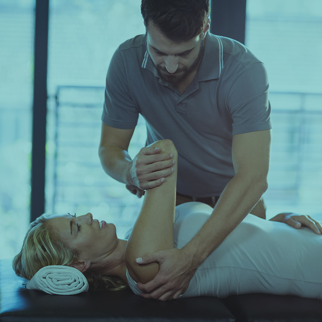 Physiotherapist with patient